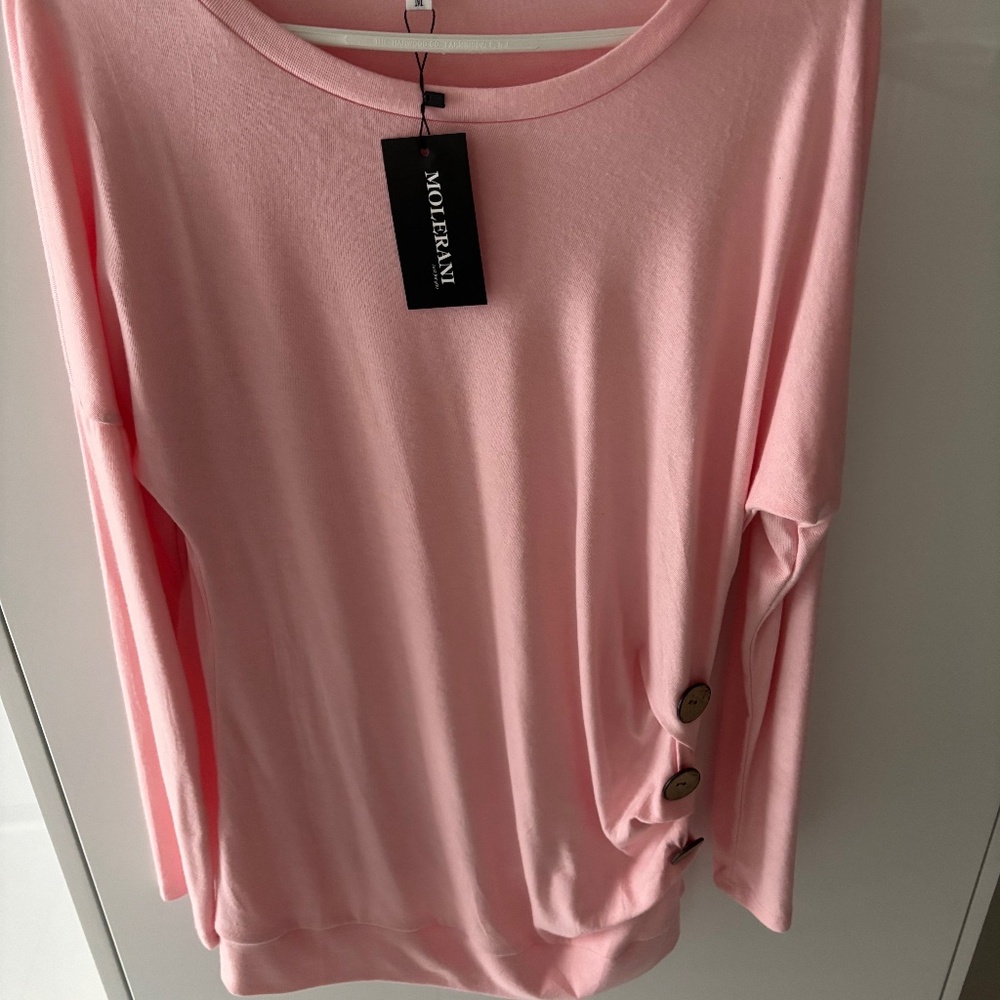 Molerani Pink Top in size M.